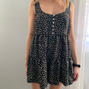 Black and white sleeveless romper